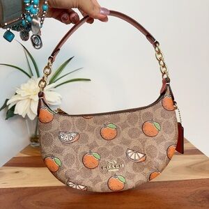 NWT COACH MINI PAYTON BAG IN SIGNATURE CANVAS WITH ORANGE PRINT‎